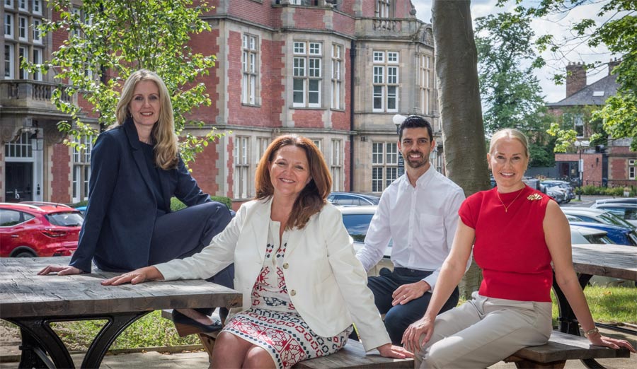 Kate Grant (Director of Estates, Adderstone Group), Sandra Manson (Executive Director of Planning, Pegasus Group), Michael Shipley (Chief Financial Officer, Adderstone Group) and Melanie Tully (Commercial Estates Manager, Adderstone Group) in front of the Adderstone Group Headquarters, The Fleming.