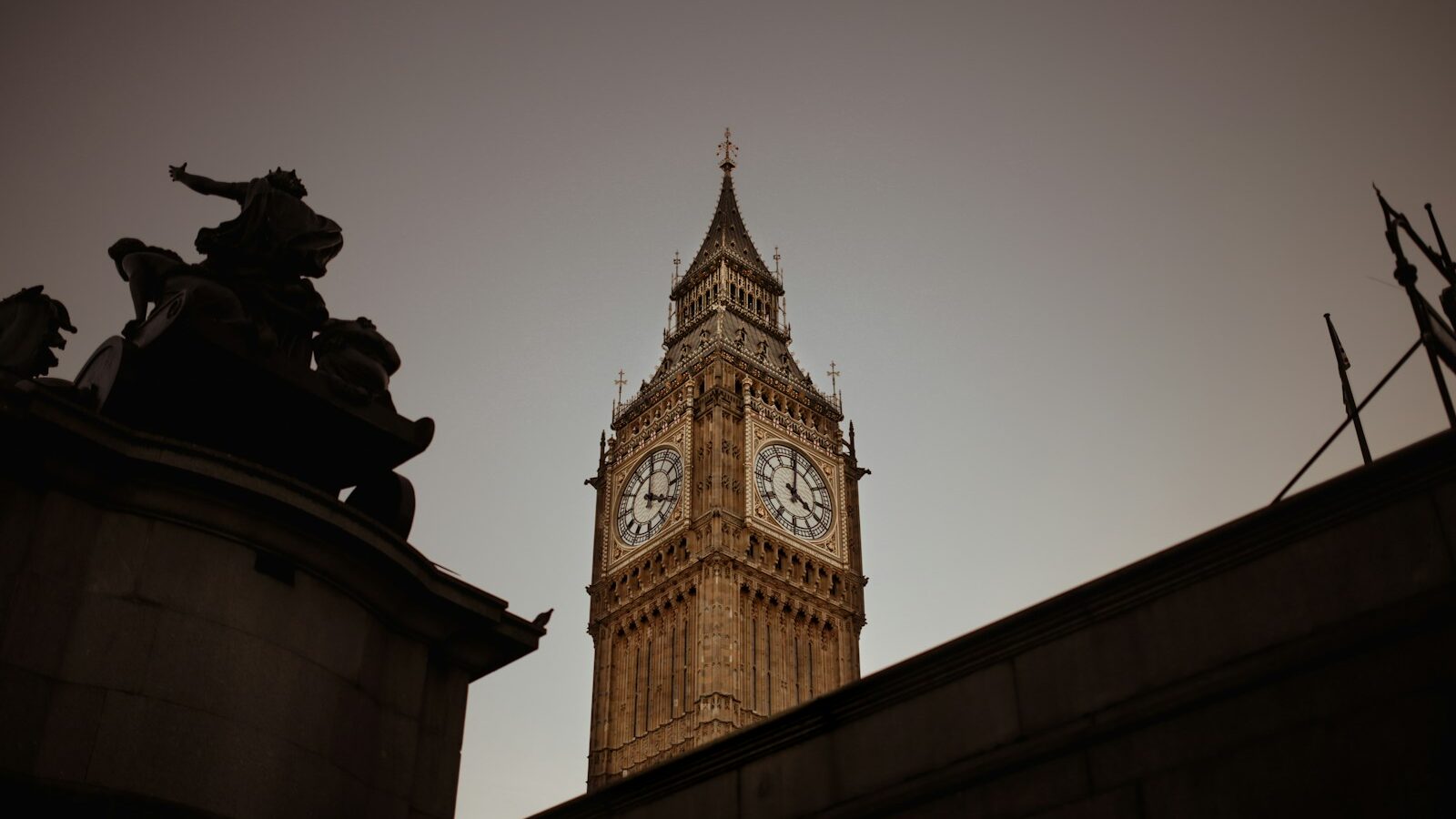 a tall clock tower towering over a city