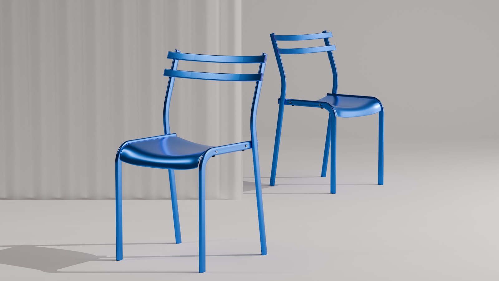 Two shiny blue chairs are pictured.
