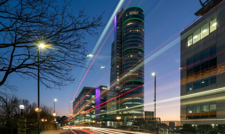 a very tall building with a lot of lights on it