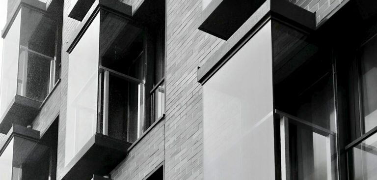Modern building facade with glass and brick details