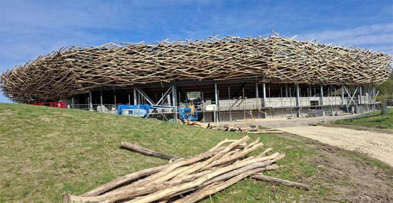 ix miles of timber will surround The Lost Feather Arena