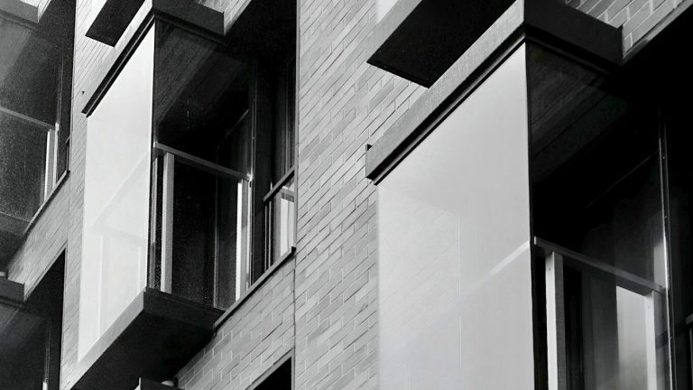 Modern building facade with glass and brick details